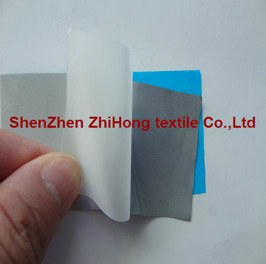 Flame retardant reflective transfer PET film for outdoor clothing